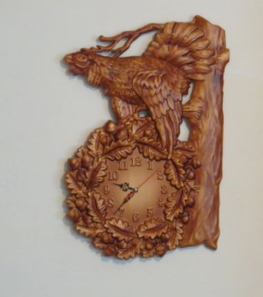 carved wooden watch