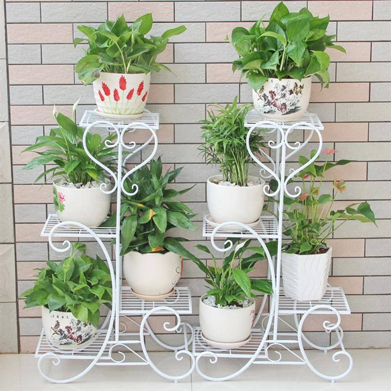 white wrought iron flower pots